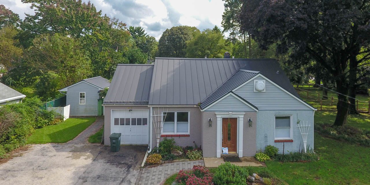 New metal roof installation on a single home New metal roof installation on a single home